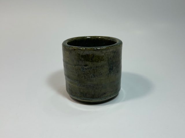 Dark glazed ceramic mug